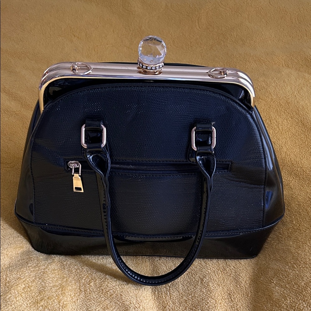 Chic Black purse with gold accents